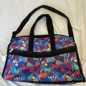 NWT Lesportsac deluxe large weekender in “Night Garden” print